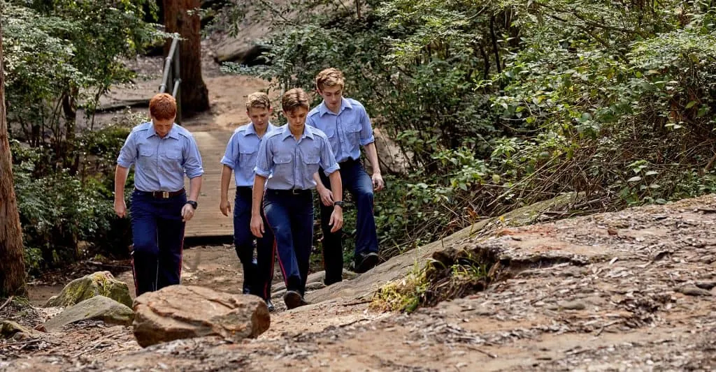 The King's Boarding School Students Walking Outdoors