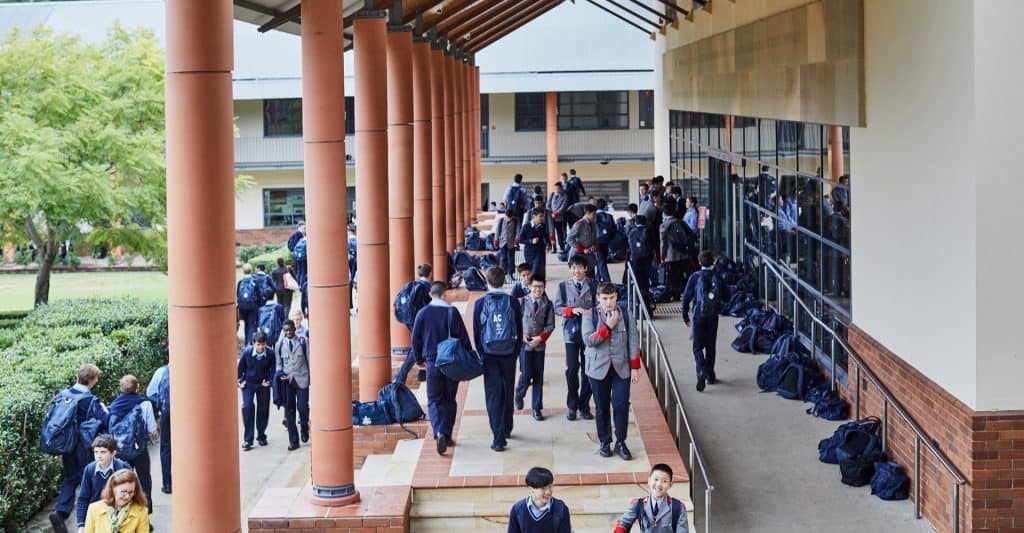 The King's School Senior Students Walking In the Hallway